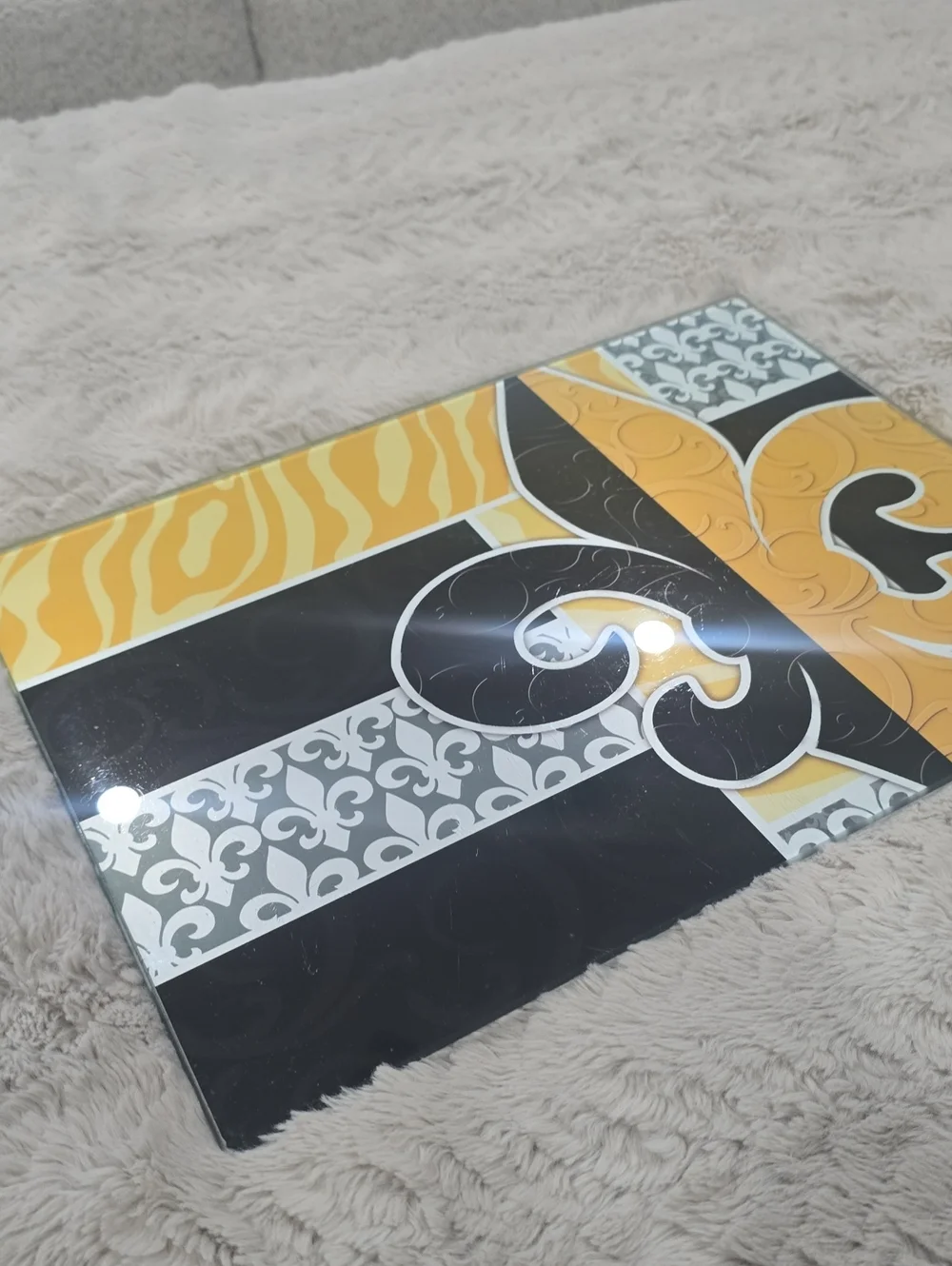 Decorative Fleur de Lis Glass Cutting Board in Yellow, Black & Gray